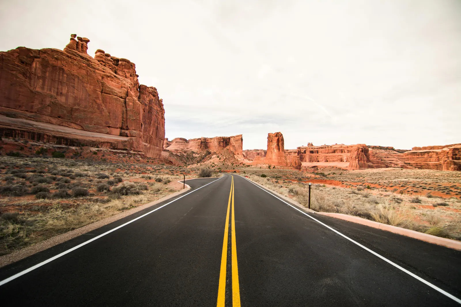 Open road through a desert landscape, representing the next leadership path.